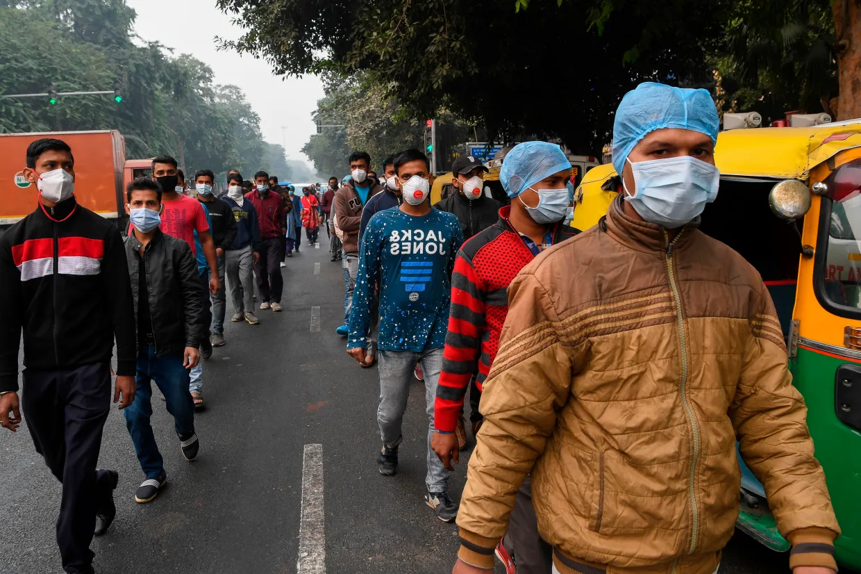 People wearing facemasks participated in a walkathon to raise awareness of Covid in New Delhi in November 2020Credit: AFP